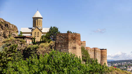 Narikala Fortress and Saint Nicholas Church sits on a hill high above the Tbilisi city centerのeditorial素材