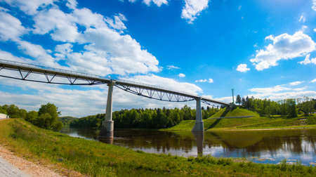 Beautiful long bridge over the river, landscapeの写真素材