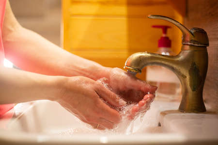 Hand wash with soap, cleanliness and hygieneの写真素材