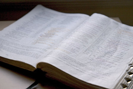 The Bible in window light