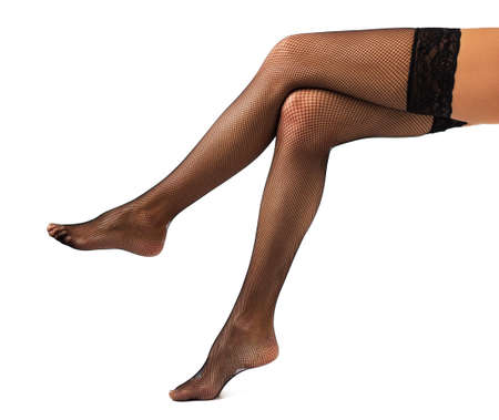 Beautiful woman legs in black stockingsの写真素材