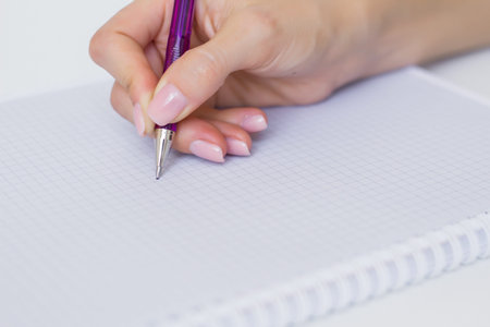 Writing down notes in paper notepad
