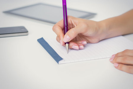 Writing down notes in paper notepad