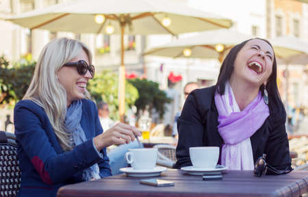 Two friends having good time togetherの写真素材