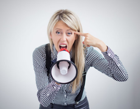 Woman screaming on megaphone