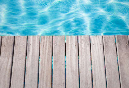 Close-up photo of empty wooden pool deckの写真素材
