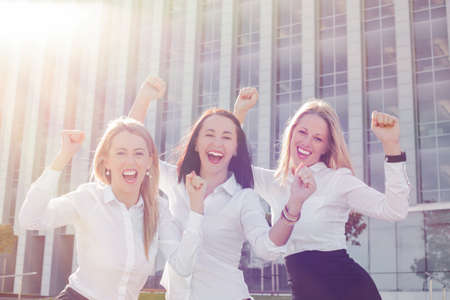 Business women celebrating their successの写真素材