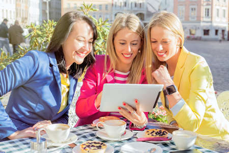 Women looking at the tabletの写真素材