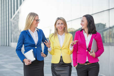Three women having a debateの写真素材