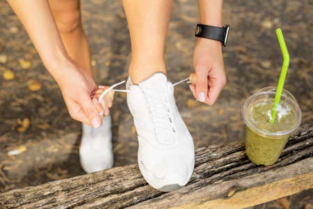 Tying running shoesの写真素材