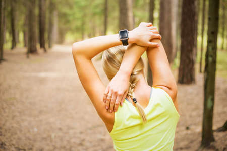 Woman stretching before physical activityの写真素材