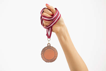 Person holding a medalの写真素材