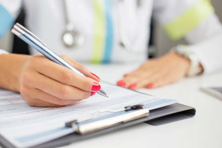 Woman doctor writingの写真素材