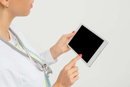 Doctor holding tabletの写真素材