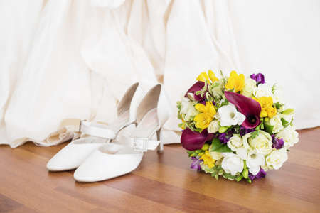 Wedding shoes and flowersの写真素材