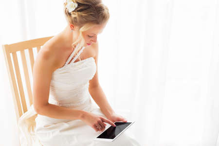 Bride using modern technologyの写真素材