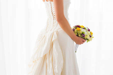 Wedding gown and flowersの写真素材