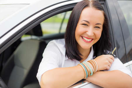 Woman with car keys in her handsの写真素材