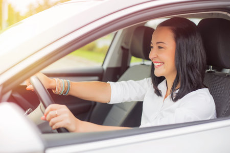 Woman driving and smiling