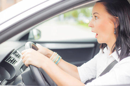 Surprised female driver