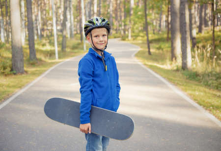 Boy with skateboardの写真素材