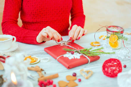 Woman wrapping giftの写真素材