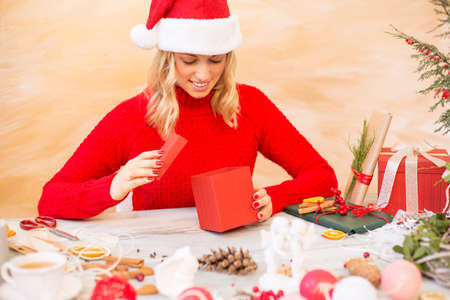 Woman preparing Christmas presentsの写真素材