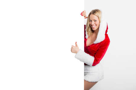 Sexy woman in red costume showing thumbs upの写真素材
