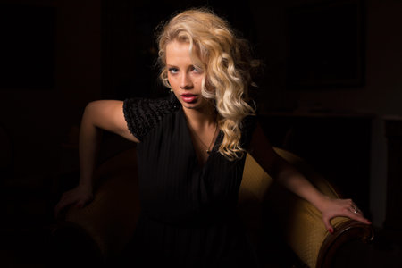 Beautiful woman sitting in chair
