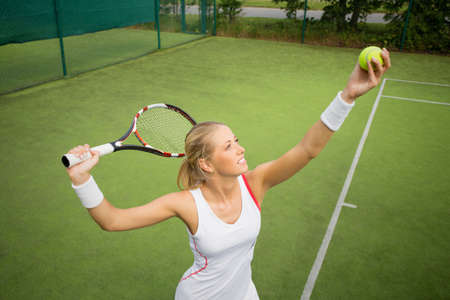 Woman in tennis practiceの写真素材