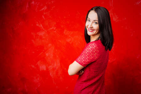 Woman standing and smilingの写真素材