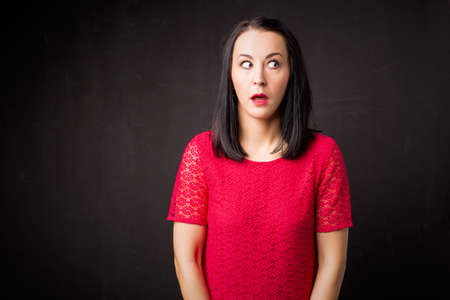 Woman looking guiltyの写真素材