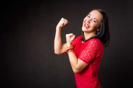 Strong woman showing her strengthの写真素材