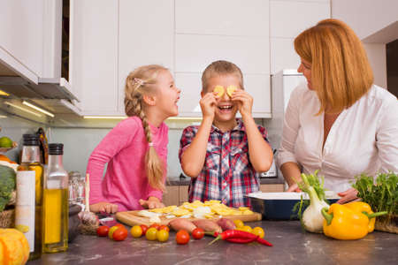 Family having fun in kitchenの写真素材