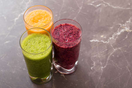 Different color smoothiesの写真素材