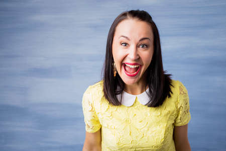 Woman laughing hystericallyの写真素材