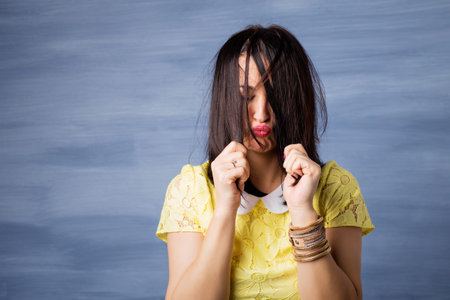 Woman playing with her hair