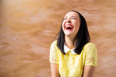 Portrait of woman laughingの写真素材