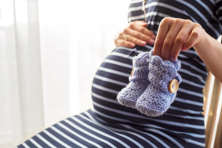Pregnant woman little baby bootsの写真素材