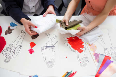 Designers choosing material for dressの写真素材