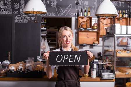 Woman promoting newly opened coffee shop
