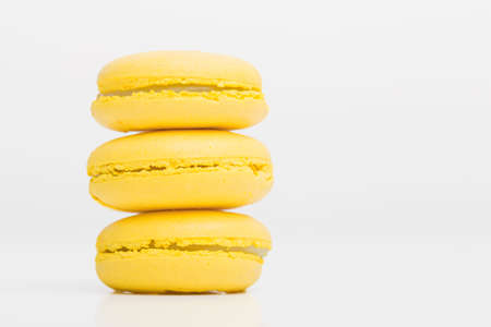 Picture of three yeallow macaroonsの写真素材