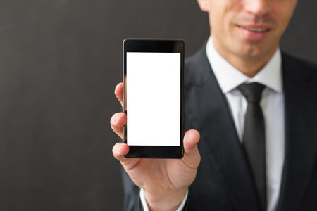 man holding blank screen smartphone
