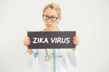 Nurse holding Zika virus signの写真素材