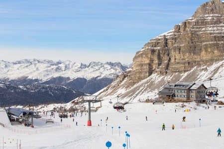 Skiers enjoying winter holidaysの写真素材