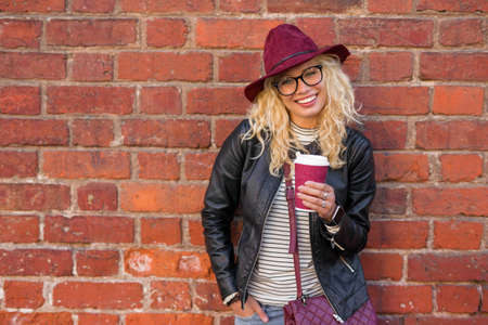 Modern woman having coffeeの写真素材