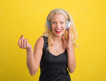 Woman enjoying musicの写真素材