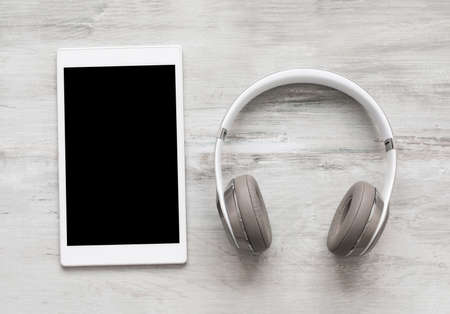 Headphones and tabletの写真素材
