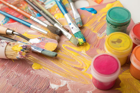 Paint brushes and color containersの写真素材