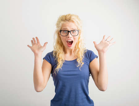 Hipster woman showing her excitementの写真素材